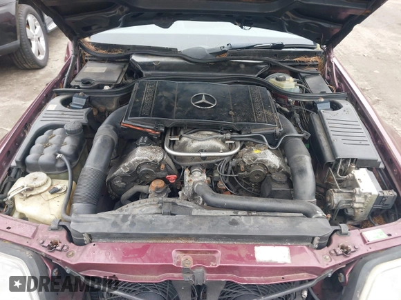 1997 Mercedes-Benz SL-Class with VIN WDBFA67F3VF142320, listed as a IAAI auction lot 41835593 with 172,151 mi miles. Bid and sale history available at carsss.com. Image 10.
