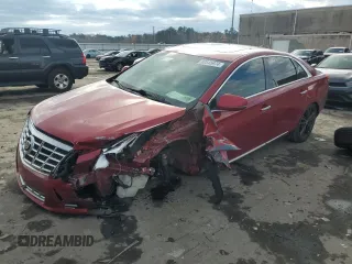 2014 Cadillac XTS Premium with VIN 2G61P5S34E9226482, listed as a Copart auction lot 82545974 with 141,492 mi miles and Salvage Title. Bid and sale history available at carsss.com. Image 1.