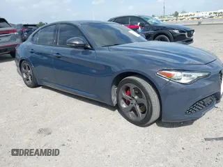 2019 Alfa Romeo Giulia z VIN ZARFAMAN9K7605109, wystawiony jako IAAI lot #41731408 z przebiegiem 55 908 mil mil oraz . Historia ofert i sprzedaży dostępna na DreamBid. Obrazek 1.