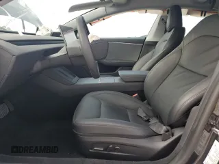 2024 Tesla Model 3 with VIN 5YJ3E1EA5RF741345, listed as a Copart auction lot 51535165 with 7,372 mi miles and Salvage Title. Bid and sale history available at DreamBid. Image 7.