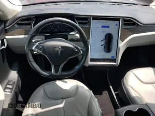 2014 Tesla Model S 60 with VIN 5YJSA1H12EFP61355, listed as a Copart auction lot 59709065 with 109,446 mi miles and Salvage title. Bid and sale history available at DreamBid. Image 8.