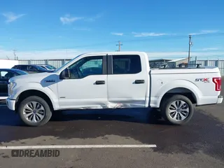 2017 Ford F-150 XL with VIN 1FTEW1EP9HFA26847, listed as a IAAI auction lot 41294852 with 152,543 mi miles. Bid and sale history available at carsss.com. Image 14.