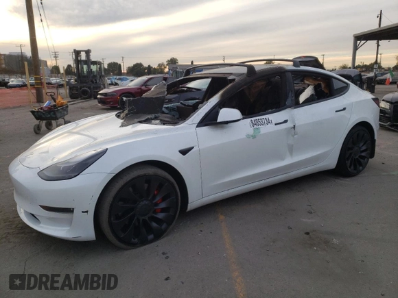 2022 Tesla Model 3 Performance with VIN 5YJ3E1EC3NF265334, listed as a Copart auction lot 84853734 with Not Provided miles and Salvage Title. Bid and sale history available at DreamBid. Image 1.