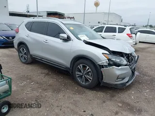 2017 Nissan Rogue SL z VIN 5N1AT2MTXHC887379, wystawiony jako IAAI lot #41559233 z przebiegiem 205 973 mil mil oraz . Historia ofert i sprzedaży dostępna na DreamBid. Obrazek 1.