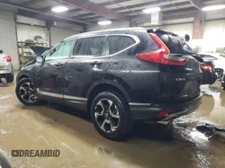 2017 Honda CR-V Touring with VIN 2HKRW2H91HH608340, listed as a Copart auction lot 43997625 with 58,446 mi miles and Salvage Title. Bid and sale history available at DreamBid. Image 2.