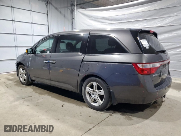 2013 Honda Odyssey Touring with VIN 5FNRL5H91DB024040, listed as a Copart auction lot 57241615 with 163,788 mi miles and Salvage title. Bid and sale history available at DreamBid. Image 2.