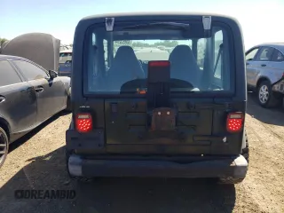 1998 Jeep Wrangler Sport with VIN 1J4FY19S2WP790179, listed as a Copart auction lot 69853294 with 148,675 mi miles and Salvage Title. Bid and sale history available at carsss.com. Image 6.