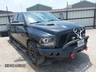2017 Ram 1500 Rebel z VIN 1C6RR7YT7HS601112, wystawiony jako IAAI lot #42262566 z przebiegiem 136 409 mil mil oraz . Historia ofert i sprzedaży dostępna na DreamBid. Obrazek 1.