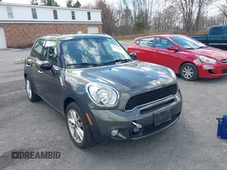 2014 MINI Countryman S with VIN WMWZC3C58EWP27041, listed as a IAAI auction lot 42082489 with 77,749 mi miles and . Bid and sale history available at DreamBid. Image 12.