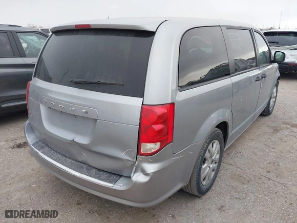 2019 Dodge Grand Caravan SE with VIN 2C4RDGBG8KR581187, listed as a IAAI auction lot 41389794 with 114,413 mi miles. Bid and sale history available at carsss.com. Image 4.