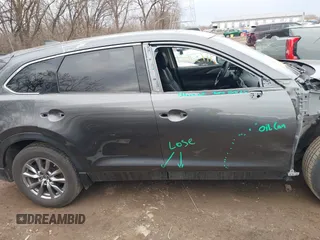 2018 Mazda CX-9 Touring with VIN JM3TCBCY3J0212479, listed as a IAAI auction lot 41737024 with 128,552 mi miles and . Bid and sale history available at DreamBid. Image 13.