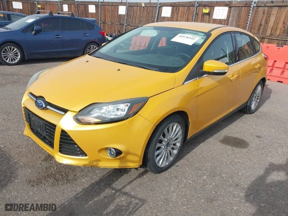 2012 Ford Focus Titanium with VIN 1FAHP3N22CL189401, listed as a IAAI auction lot 40978545 with NaN miles. Bid and sale history available at carsss.com. Image 2.