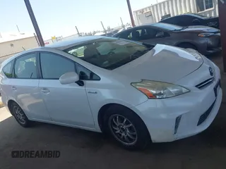 2014 Toyota Prius Two z VIN JTDZN3EU8E3356711, wystawiony jako IAAI lot #42421684 z przebiegiem 228 729 mil mil oraz . Historia ofert i sprzedaży dostępna na DreamBid. Obrazek 13.