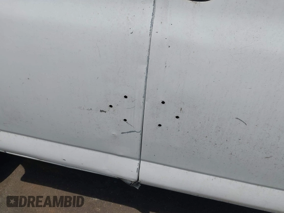 2007 Chevrolet Express Cargo with VIN 1GCGG25V371124133, listed as a IAAI auction lot 42585528 with Not provided miles and . Bid and sale history available at DreamBid. Image 13.