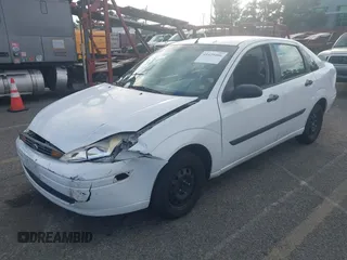2000 Ford Focus LX with VIN 1FAFP33P3YW254784, listed as a IAAI auction lot 41429406 with 88,572 mi miles and . Bid and sale history available at carsss.com. Image 2.