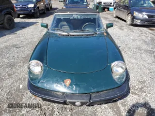 1983 Alfa Romeo Spider Veloce z VIN ZARBA541XD1016802, wystawiony jako Copart lot #51383595 z przebiegiem 127 904 mil mil oraz Czysty tytuł • Clean title. Historia ofert i sprzedaży dostępna na DreamBid. Obrazek 5.