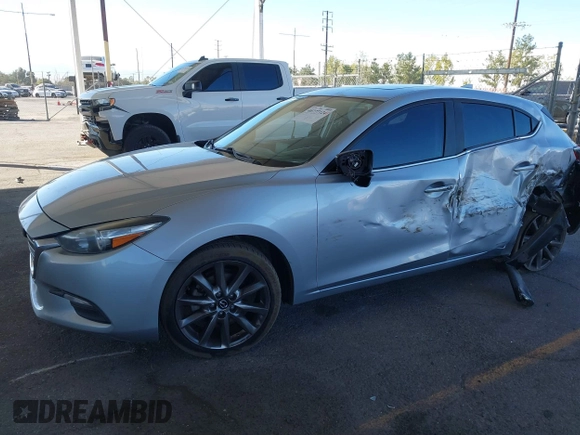 2018 Mazda 3 Touring with VIN 3MZBN1L31JM163466, listed as a IAAI auction lot 40777124 with 101,497 mi miles and . Bid and sale history available at carsss.com. Image 16.