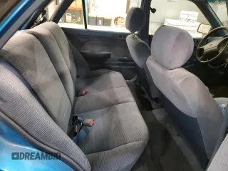 1994 Ford Escort z VIN 1FARP14J9RW318226, wystawiony jako Copart lot #60507135 z przebiegiem 69 041 mil mil oraz Szkoda całkowita • Salvage title. Historia ofert i sprzedaży dostępna na DreamBid. Obrazek 10.