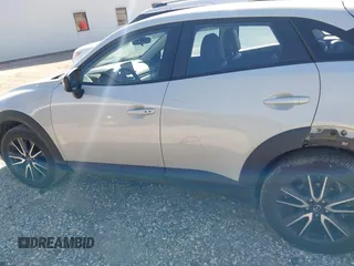 2018 Mazda CX-3 Touring z VIN JM1DKFC77J0331828, wystawiony jako IAAI lot #40482555 z przebiegiem 101 473 mil mil oraz . Historia ofert i sprzedaży dostępna na DreamBid. Obrazek 15.