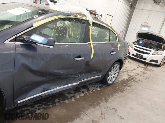 2013 Buick LaCrosse Touring with VIN 1G4GJ5E33DF204267, listed as a IAAI auction lot 42299135 with 82,323 mi miles and . Bid and sale history available at DreamBid. Image 6.