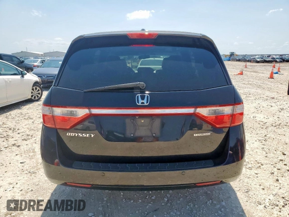 2011 Honda Odyssey Touring with VIN 5FNRL5H90BB033700, listed as a Copart auction lot 58602835 with 197,063 mi miles and Clean title. Bid and sale history available at DreamBid. Image 6.
