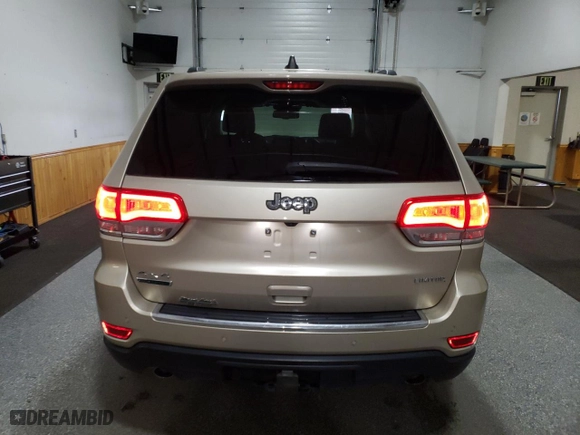 2014 Jeep Grand Cherokee Limited with VIN 1C4RJFBM1EC375795, listed as a Copart auction lot 52327535 with 71,294 mi miles and Clean Title. Bid and sale history available at carsss.com. Image 6.