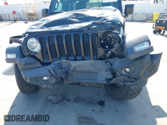 2020 Jeep Wrangler Unlimited Freedom with VIN 1C4HJXDG0LW238819, listed as a IAAI auction lot 42139357 with 67,619 mi miles and . Bid and sale history available at DreamBid. Image 12.