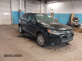 2011 Volkswagen Touareg Sport with VIN WVGFF9BP5BD001093, listed as a IAAI auction lot 41916995 with 127,478 mi miles and . Bid and sale history available at DreamBid. Image 1.