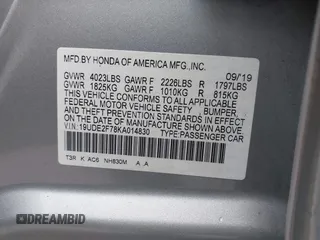 2019 Acura ILX w/Premium Pkg with VIN 19UDE2F78KA014830, listed as a IAAI auction lot 38611591 with 70,944 mi miles. Bid and sale history available at carsss.com. Image 9.