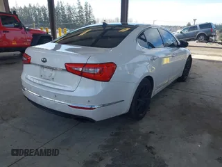 2014 Kia Cadenza Premium with VIN KNALN4D74E5138497, listed as a IAAI auction lot 41678439 with 155,194 mi miles. Bid and sale history available at carsss.com. Image 4.