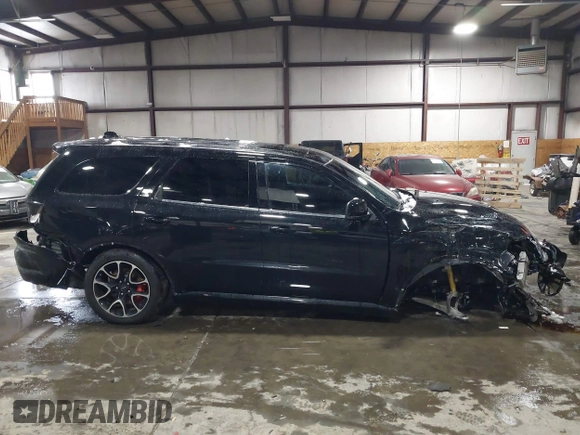 2023 Dodge Durango SRT Hellcat Premium z VIN 1C4SDJH90PC596225, wystawiony jako IAAI lot #41600943 z przebiegiem 18 877 mil mil oraz . Historia ofert i sprzedaży dostępna na DreamBid. Obrazek 14.