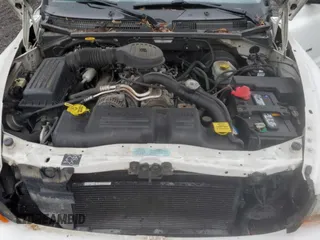 2001 Dodge Durango z VIN 1B4HS28Z21F570427, wystawiony jako Copart lot #58657475 z przebiegiem 114 295 mil mil oraz Tytuł czysty. Historia ofert i sprzedaży dostępna na DreamBid. Obrazek 12.