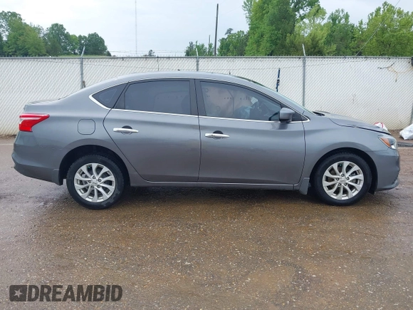 2019 Nissan Sentra S z VIN 3N1AB7AP7KY364754, wystawiony jako IAAI lot #42056332 z przebiegiem 170 068 mil mil oraz . Historia ofert i sprzedaży dostępna na DreamBid. Obrazek 13.