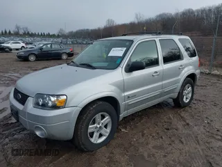 2006 Ford Escape Hybrid with VIN 1FMCU96H16KB20756, listed as a IAAI auction lot 41223286 with 101,829 mi miles and . Bid and sale history available at DreamBid. Image 2.
