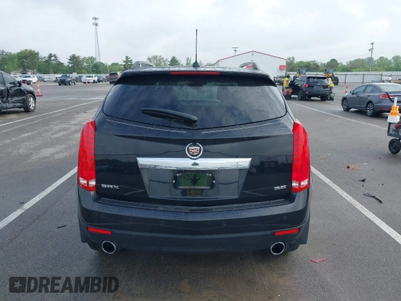 2015 Cadillac SRX Performance Collection with VIN 3GYFNCE3XFS638994, listed as a IAAI auction lot 42243558 with 141,704 mi miles and . Bid and sale history available at DreamBid. Image 16.