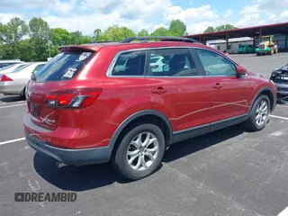 2014 Mazda CX-9 Touring with VIN JM3TB2CA7E0427214, listed as a IAAI auction lot 42175140 with 182,091 mi miles and . Bid and sale history available at carsss.com. Image 4.