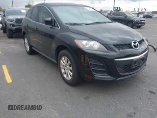 2010 Mazda CX-7 Sport with VIN JM3ER2WM1A0348304, listed as a IAAI auction lot 42053541 with 123,099 mi miles. Bid and sale history available at carsss.com. Image 1.