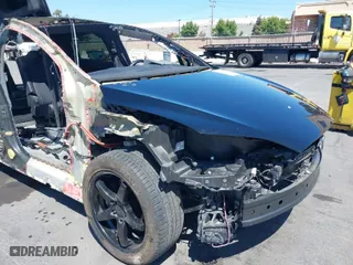2020 Tesla Model X Long Range with VIN 5YJXCAE24LF272238, listed as a IAAI auction lot 40251868 with 99,362 mi miles. Bid and sale history available at carsss.com. Image 6.