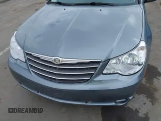 2010 Chrysler Sebring Limited with VIN 1C3CC5FD4AN155803, listed as a IAAI auction lot 42172797 with 107,408 mi miles. Bid and sale history available at carsss.com. Image 6.