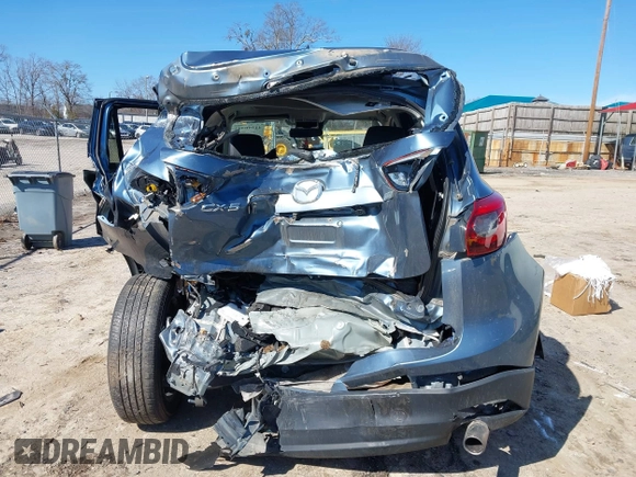 2016 Mazda CX-5 Grand Touring with VIN JM3KE2DY2G0715272, listed as a IAAI auction lot 41590492 with 134,176 mi miles. Bid and sale history available at carsss.com. Image 17.