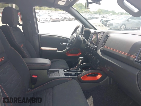 2022 Nissan Frontier Pro-4X z VIN 1N6ED1EK3NN634775, wystawiony jako IAAI lot #42789790 z przebiegiem 25 453 mil mil oraz . Historia ofert i sprzedaży dostępna na DreamBid. Obrazek 5.