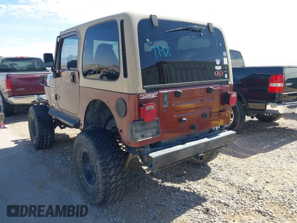 2001 Jeep Wrangler Sahara with VIN 1J4FA59S71P326941, listed as a IAAI auction lot 41648420 with 128,464 mi miles. Bid and sale history available at carsss.com. Image 3.