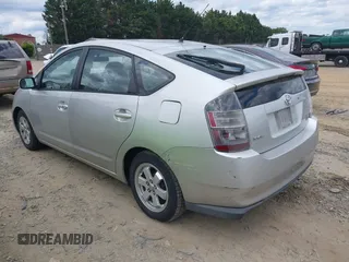 2005 Toyota Prius z VIN JTDKB20U953016544, wystawiony jako IAAI lot #42351340 z przebiegiem 198 989 mil mil oraz . Historia ofert i sprzedaży dostępna na DreamBid. Obrazek 3.