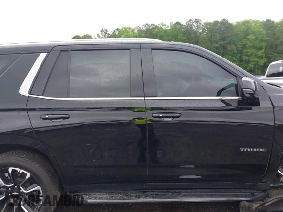 2023 Chevrolet Tahoe LT z VIN 1GNSKNKD5PR407387, wystawiony jako IAAI lot #42242283 z przebiegiem 23 781 mil mil oraz . Historia ofert i sprzedaży dostępna na DreamBid. Obrazek 14.