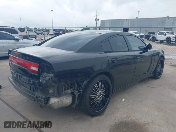 2014 Dodge Charger SE with VIN 2C3CDXBG8EH215850, listed as a IAAI auction lot 42077242 with 179,360 mi miles and . Bid and sale history available at carsss.com. Image 4.