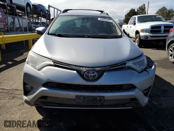 2018 Toyota RAV4 XLE with VIN JTMRFREV6JD244065, listed as a Copart auction lot 49099265 with 121,698 mi miles and Salvage Title. Bid and sale history available at carsss.com. Image 5.