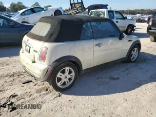 2007 MINI Convertible with VIN WMWRF33507TF67302, listed as a Copart auction lot 82853344 with Not Provided miles and Clean Title. Bid and sale history available at DreamBid. Image 3.