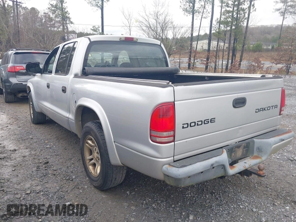 2003 Dodge Dakota z VIN 1D7HL38Z83S184469, wystawiony jako IAAI lot #41714931 z przebiegiem 194 373 mil mil oraz . Historia ofert i sprzedaży dostępna na DreamBid. Obrazek 3.
