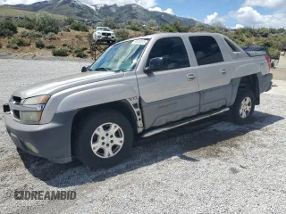 2004 Chevrolet Avalanche Z71 z VIN 3GNEK12T84G176154, wystawiony jako Copart lot #56925875 z przebiegiem 231 660 mil mil oraz Szkody całkowita. Historia ofert i sprzedaży dostępna na DreamBid. Obrazek 1.