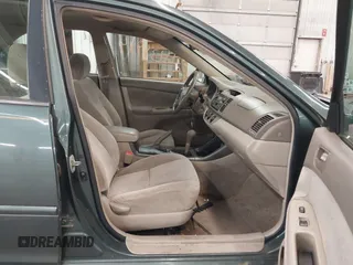2004 Toyota Camry LE with VIN 4T1BE32K04U361670, listed as a IAAI auction lot 42139994 with 205,899 mi miles. Bid and sale history available at carsss.com. Image 5.